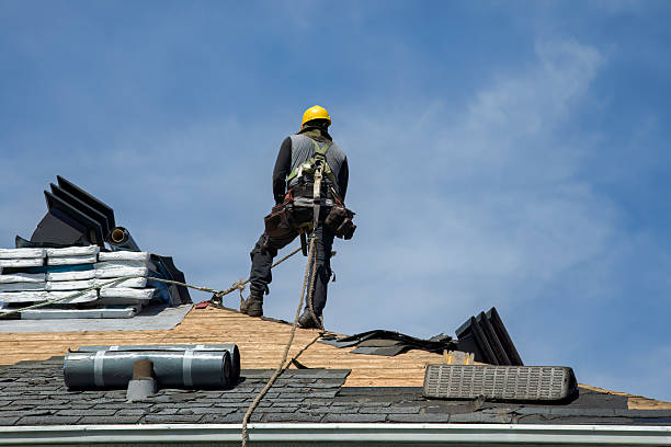 Professional Storm Damage Roof Repair technician working in Fancher, NY
